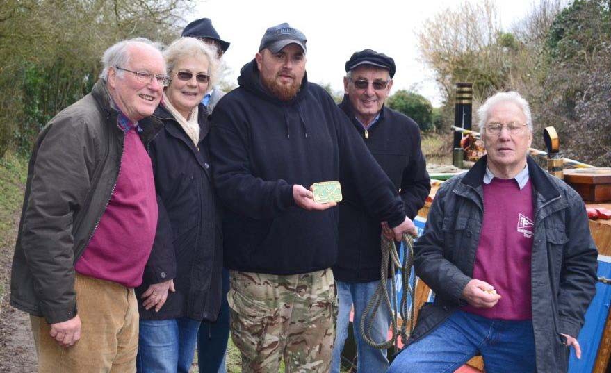 Members of the Wendover Arm Trust and The Friends of Raymond after the trip with Nick Scarcliffe holding the Wendover Arm plaque
